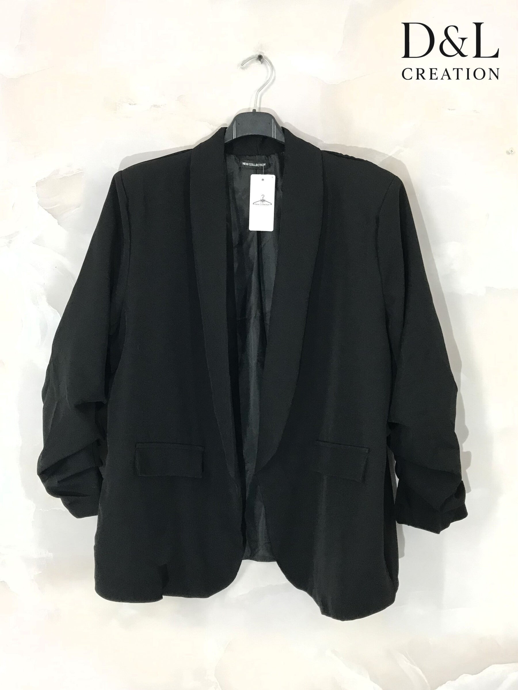 Blazer jacket with rolled-up sleeves and faux pockets