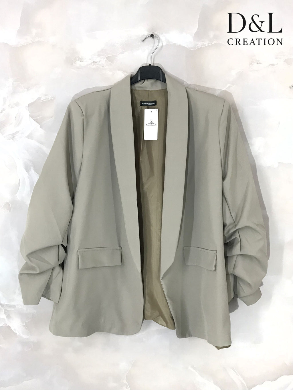 Blazer jacket with rolled-up sleeves and faux pockets